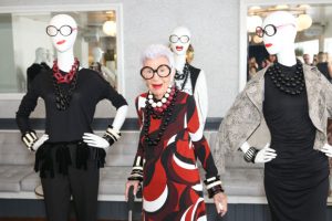 Iris Apfel poses with her designs at the Iris X INC debut. Photography courtesy of BFA.